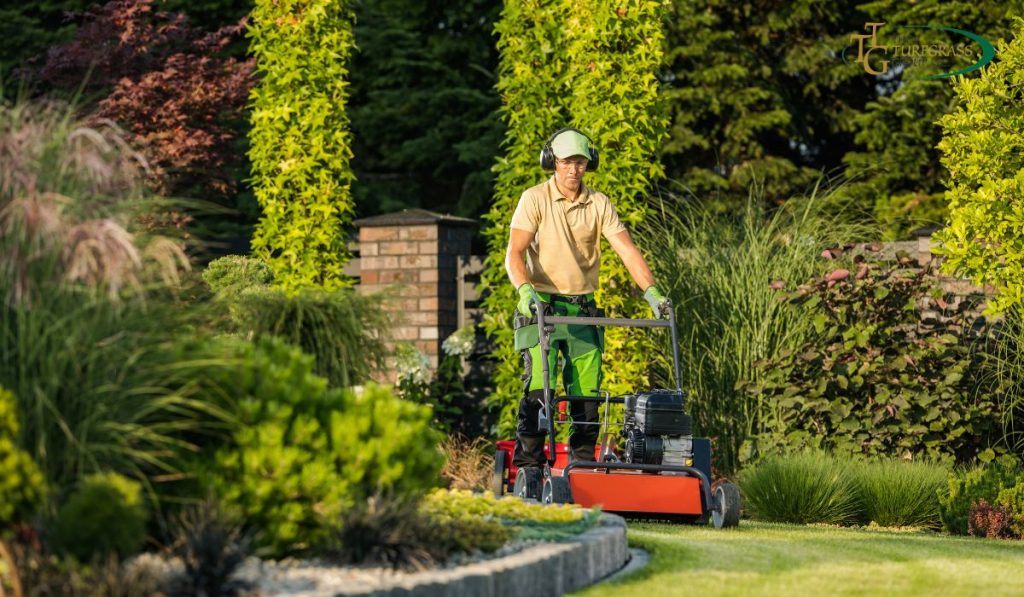 guy mowing lawn